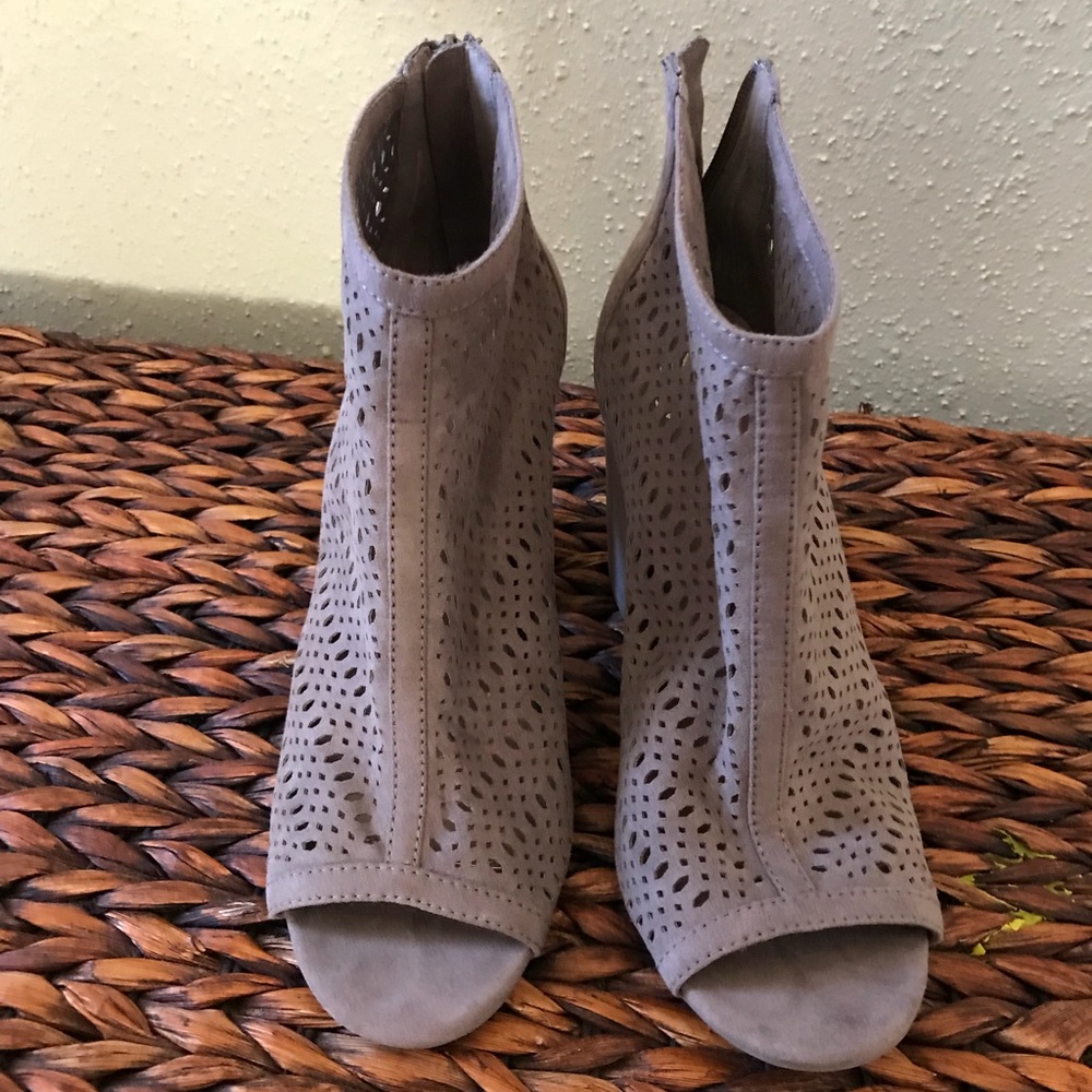 Perforated tan booties in size 8